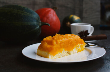 Pumpkin Cottage Cheese Cake. Cottage cheese sweet casserole with pumpkin layer on a plate. The...