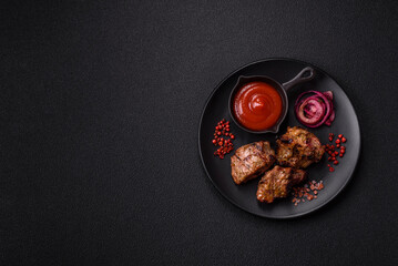 Pieces of beef meat cut into slices, marinated with salt and spices