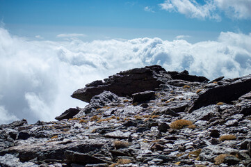 Cloudy over mountains on hiking trail to Mulhacen peak, Sierra Nevada National park, Andalusia, Spain