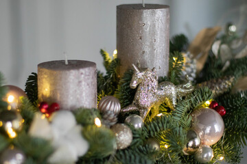 Christmas floral composition of fresh Nobilis. Cotton flowers spruce, sparkling ornaments. Holiday concept. Happy New Year decorations. Ideal decoration article for office and home tables.