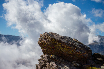 Cloudy over mountains on hiking trail to Mulhacen peak, Sierra Nevada National park, Andalusia, Spain