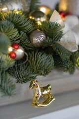 Christmas floral composition of fresh Nobilis. Cotton flowers spruce, sparkling ornaments. Holiday concept. Happy New Year decorations. Ideal decoration article for office and home tables.