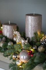 Christmas floral composition of fresh Nobilis. Cotton flowers spruce, sparkling ornaments. Holiday concept. Happy New Year decorations. Ideal decoration article for office and home tables.