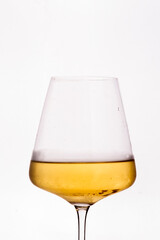 close up of chilled isolated white wine glass on white background