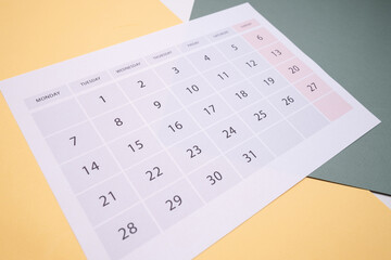 Monthly calendar. Calendar with date on paper. Day planner. Schedule of the week, month and year. Modern organizer. Business diary. Deadline reminder. Daily event management. Template and grid