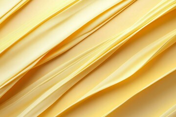 Soft orange fabric flowing with warm sunlight creating dynamic patterns on a wall