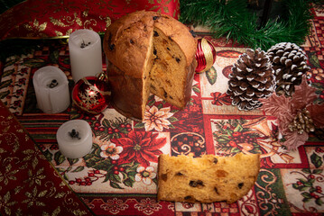 Christmas table with panettone, beautiful table decorated with Christmas objects and a delicious panettone, selective focus.