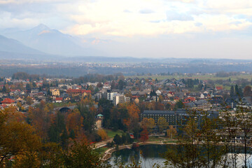 Traditional architecture and beautiful autumn foliage on the coast of Lake Bled, Slovenia. 
