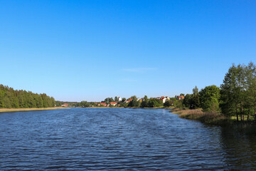 View from Lake Widmińskie towards the summer resort of Wydminy, Poland, Warmian-Masurian Voivodeship