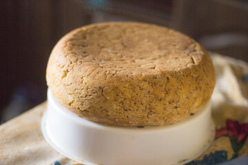 Freshly baked homemade bread is lying and cooling down.