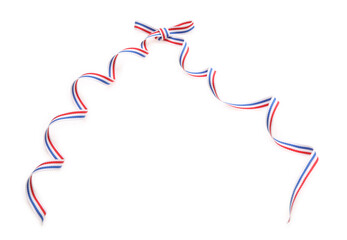 Ribbon with bow in colors of Netherlands flag isolated on white, top view