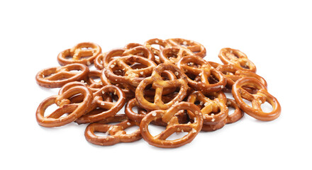 Many delicious pretzel crackers isolated on white