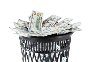 Many dollar banknotes in trash bin isolated on white