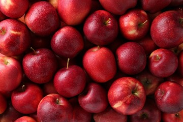 Fresh ripe red apples as background, top view