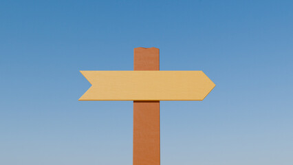 Simple wooden sign with an arrow pointing to the right, against a blue sky. It symbolizes the journey, direction and choice. Perfect for projects that seek to convey a sense of adventure and purpose.