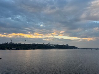 Naklejka premium sunset over the river