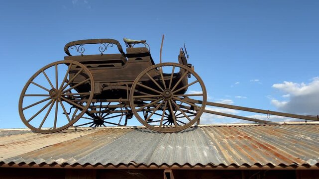 Old horse wagon on roof of an old farm in the outback of Queensland, Australia.