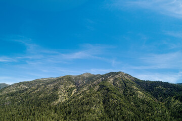 Breathtaking Mountain Landscape Under Vast Clear Blue Sky