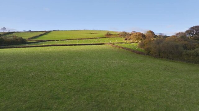 Farms over Trecastle from a drone at sunset, Brecon Beacons National Park, Powys, Wales, England