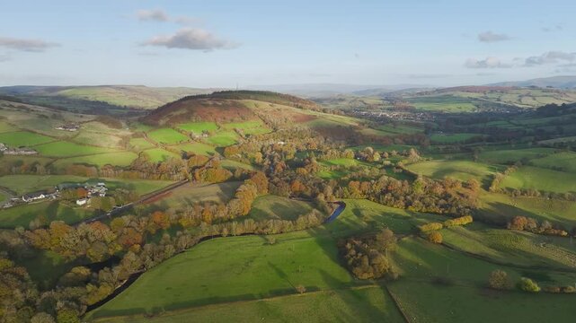 Farms over Trecastle from a drone at sunset, Brecon Beacons National Park, Powys, Wales, England