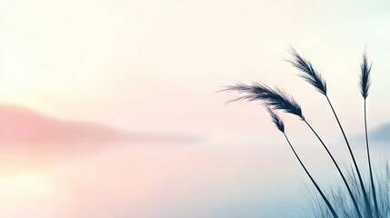    tall grass in front of a serene body of water under a vibrant pink and blue sky