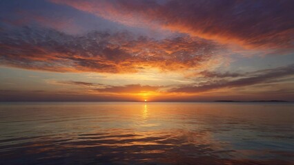 Fototapeta premium Breathtaking Ocean Sunset with Fiery Sky Reflections