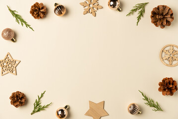 Christmas or new year frame on beige background. Flat lay, top view. Copy space
