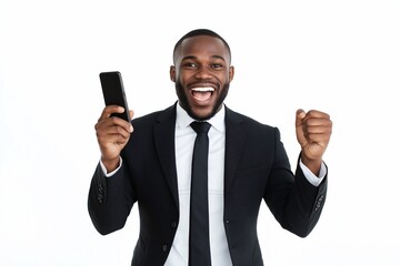Naklejka premium Happy young African American business man winner isolated on white background, the guy using smartphone celebrating online win success getting new good job opportunity with mobile cell phone.
