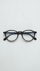 Black-framed eyeglasses on a gradient background, stylish and modern
