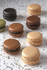 Fototapeta premium Elegant Macaron Dessert Collection for Culinary Art, Food Photography, and Celebration-Themed Design Projects – Ideal for Bakeries, Cafés, and Gourmet Marketing