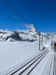 Stunning view of the Matterhorn peak on the train and glacier in Zermatt.	