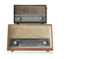 front view small old wooden brown and black radio on large old brown radio on white background, object, decor, fashion, copy space