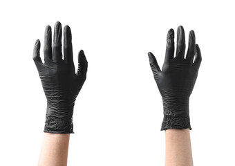 Man wearing black latex gloves on white background, closeup
