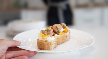 breakfast cooked and served on a white plate