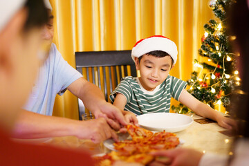 Asian family celebrate Christmas Festival together.