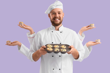 Male chef and hands with tasty muffins on lilac background