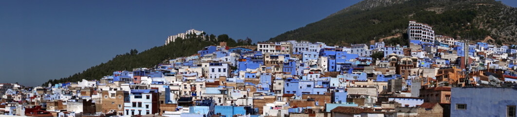 Fototapeta premium Panorama of the medina on the slopes of a mountain in Chefchaouen, Morocco