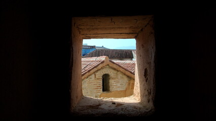 Window in a thick wall in the kasbah in the medina in Chefchaouen, Morocco