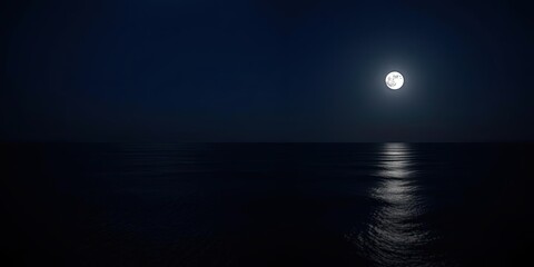 Serene full moon night over calm ocean waters with reflections, moonlight, waters