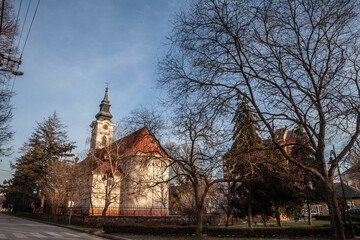 Fototapeta premium The Rimokatolicka Crkva Svete Terezije Avilske church in Kovin, Serbia, stands as a historic Catholic landmark showcasing intricate architecture and religious heritage.