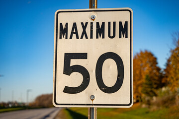 Maximum 50 speed road sign.