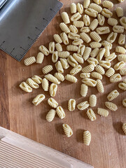 Homemade pasta on a wooden table block