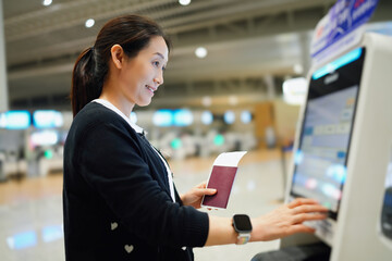 Efficient Travel Experience: Woman Using Self-Service Check-In Kiosk at Airport