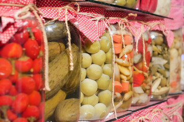 Canned fruits and vegetables in glass jars