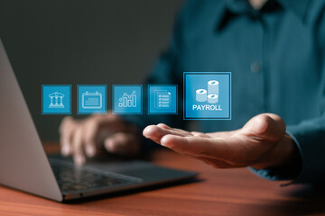 Payroll business finance concept, financial, accounting. Businessman using laptop with payroll icon...