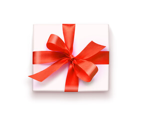 White gift box with red ribbon top view isolated on white