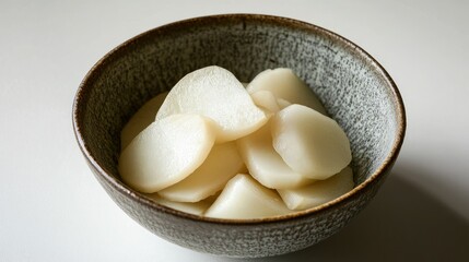 Fresh Slices of White Radish in a Bowl