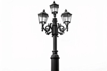 Black street lamp post on white background