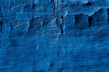 Grunge classic blue concrete background. Textured plaster wall. Creative backdrop for your design....