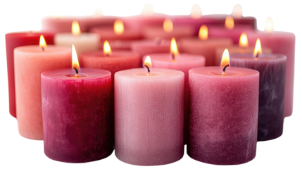 Assorted pillar candles in shades of pink and red 